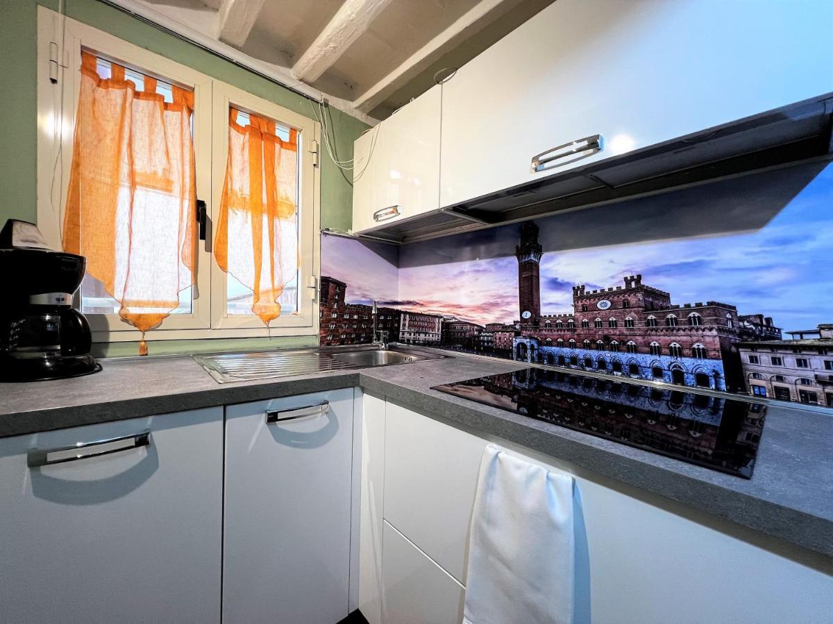 Apartamento Mezzanino Al Porrione Siena Exterior foto